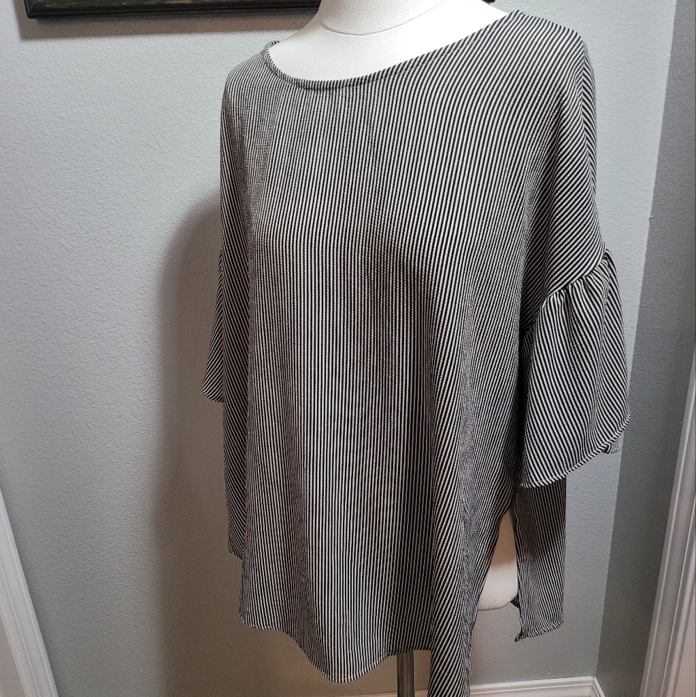Woman's size Medium Love and Kuza shirt